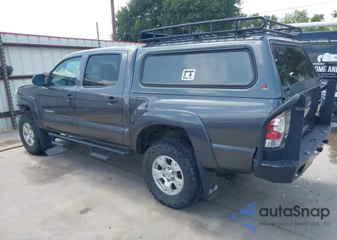 2015 Toyota Tacoma Base V6 z USA, uszkodzony, nr VIN 5TFLU4EN0FX145357